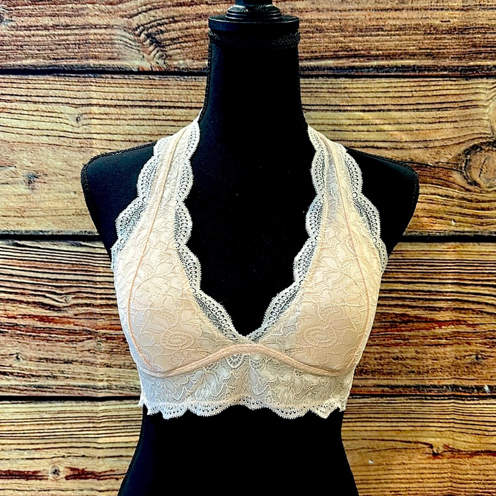 Light pink over the neck, open back bralette